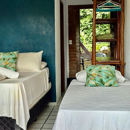 Novos Baianos Hostel E Pousada Порту-Сегуру Экстерьер фото