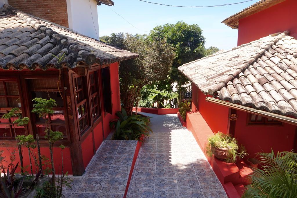 Novos Baianos Hostel E Pousada Порту-Сегуру Экстерьер фото A street in the village